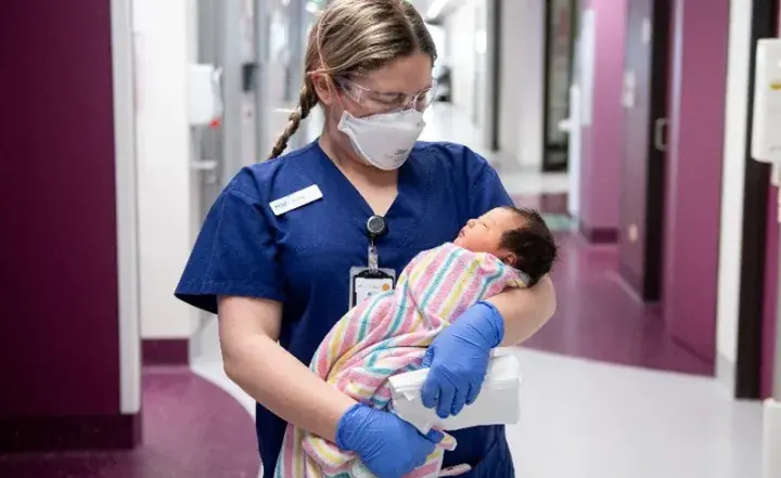 Baby with woman